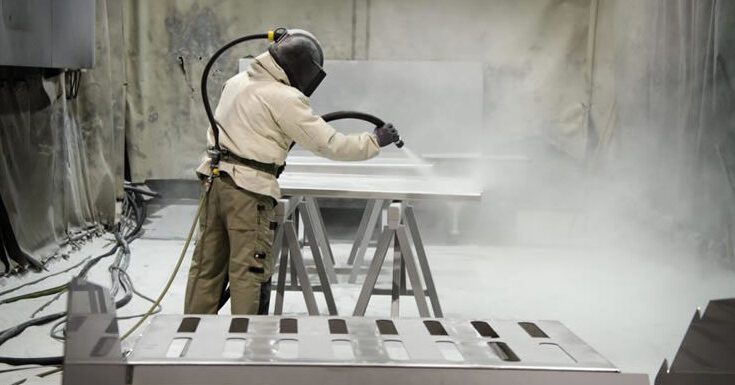 How does a sandblasting machine work