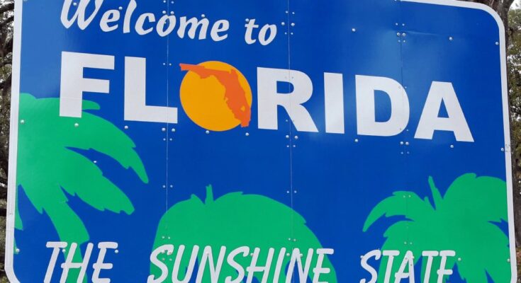 A close-up of the official "Welcome to Florida" sign. This is the official sign you see when driving across state lines.